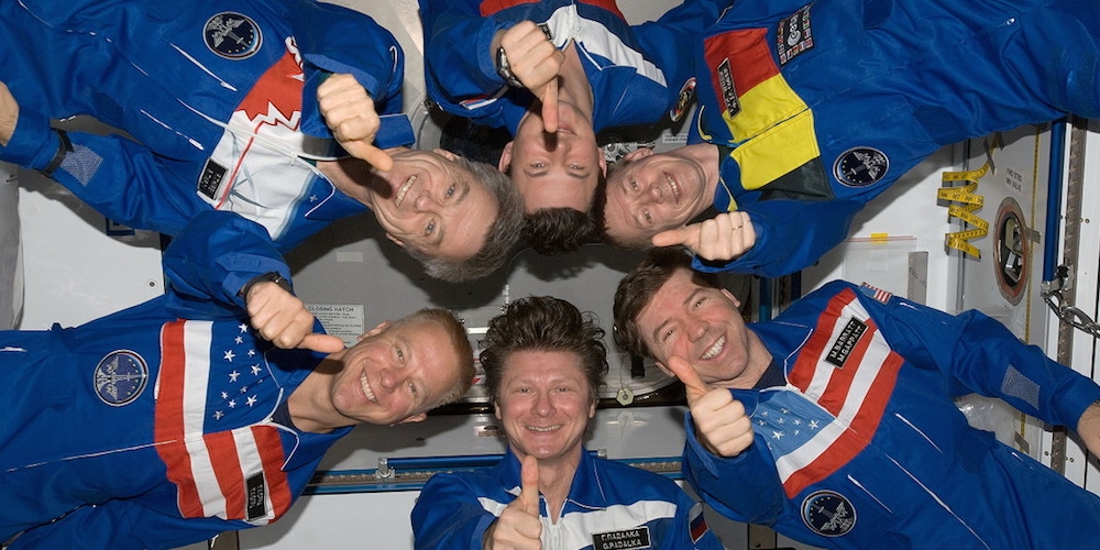 Frank De Winne samen met zijn mede ISS-bewoners